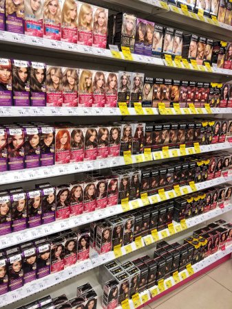 Photo for 22.01.2023 Ukraine, Kharkiv, cosmetics and hair care store. Large selection of hair dye from different brands. Stand with women's hair dye - Royalty Free Image