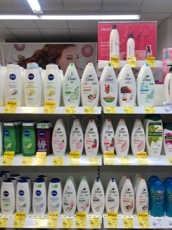 Photo for 12.03.2023 Ukraine, Kharkov Large range of Nivea and Dove brand shower gels on the shelves of a cosmetic store - Royalty Free Image