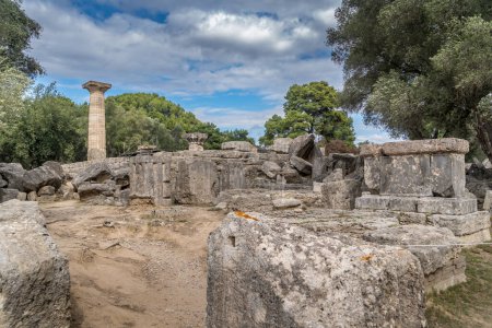 Photo for Ruins of an ancient, classical Greek temple from the 5th century B.C. dedicated to the god Zeus in Olympia Greece - Royalty Free Image