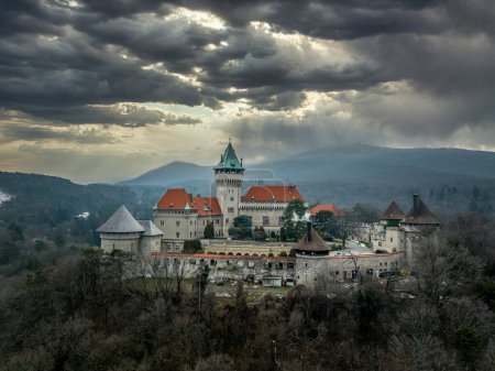 Foto de Smolenice Szomolany historic romantic castle on a hill with a surrounding park, guided tours & rental for special events in Slovakia with dramatic sunset sky - Imagen libre de derechos