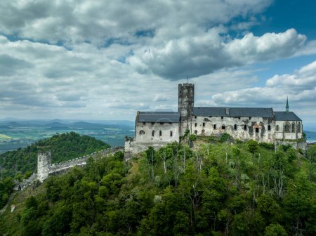 Photo for Aerial view of Bezdez Gothic medieval castle ruin in the Czech Republic with circular tower and palace - Royalty Free Image