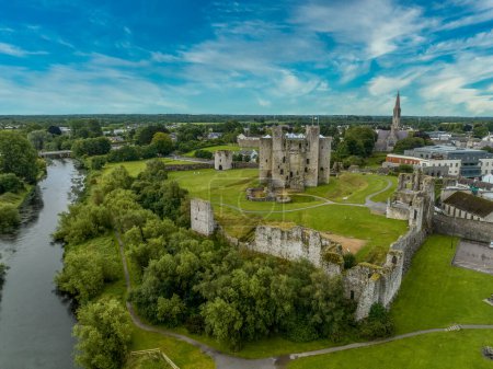 Photo for Aerial view of Trim castle popular filming location for medieval movies Norman keep with enclosing walls on the river Boyne in County Meath Ireland - Royalty Free Image