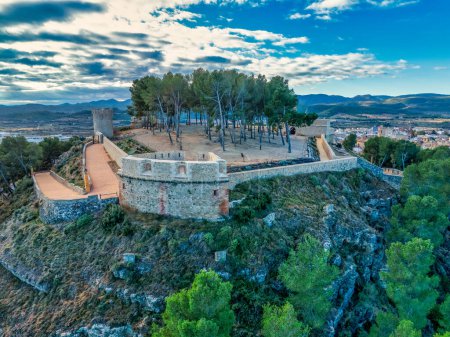 Aerial view of Segorbe castle, restored medieval hilltop stronghold with angled gun platform bastions on each corner, in Castello province Spain