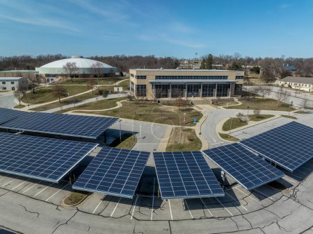 Aerial view of Community College of Baltimore County Catonsville with solar panel covered parking lots, wellness athletic center, continuing education, social science hall, admissions office