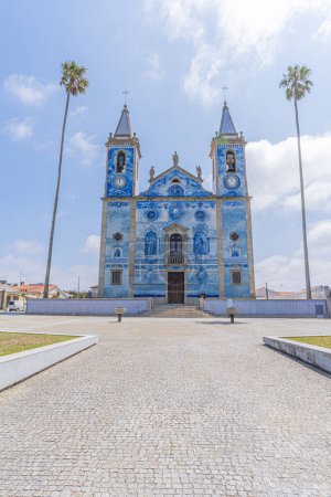 Photo for Cortegaca, Portugal - 20 June 2023: tipical blue tiled portuguese church with palm trees, Igreja de Santa Maria de Cortegaca - Royalty Free Image
