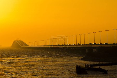 Photo for King Fahd causeway in sunset background - Royalty Free Image