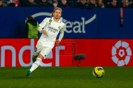 Téléchargez les photos : Madrid, Spain- February 18, 2023: League match between Real Madrid and Osasuna in Pamplona. Luka Modric with the ball. Real Madrid player. - en image libre de droit
