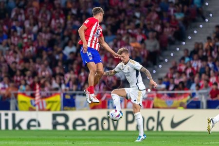 Photo for Madrid, Spain- September 24, 2023: League match between Atletico de Madrid and Real Madrid. Toni Kross with the ball. Football players. Victory for Atletico de Madrid. - Royalty Free Image