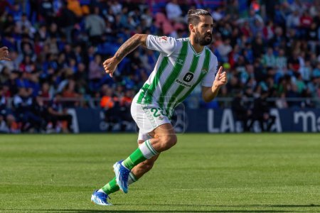 Photo for Madrid, Spain- October 21, 2023: League match between Getafe F.C and Betis played in Madrid. Football players. Isco Alarcon with the ball. - Royalty Free Image