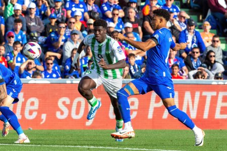 Photo for Madrid, Spain- October 21, 2023: League match between Getafe F.C and Betis played in Madrid. Football players. Assane Diao with the ball. - Royalty Free Image