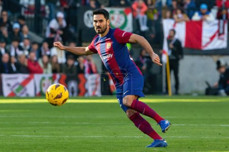 Photo for Madrid, Spain- November 25, 2023: League match between Rayo Vallecano and F.C Barcelona in Madrid. Gundogan with the ball. Football players. - Royalty Free Image