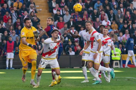 Photo for Madrid, Spain- November 25, 2023: League match between Rayo Vallecano and F.C Barcelona in Madrid. Football players. - Royalty Free Image