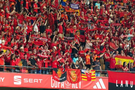 Photo for Seville, Spain- April 6, 2024: Final of the Copa del Rey soccer match between Athletic Club de Bilbao and Real Mallorca. Mallorca fans during the match. - Royalty Free Image