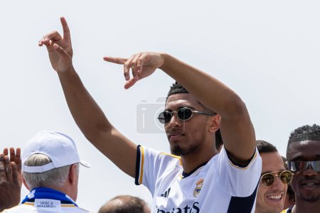Photo for Madrid, Spain - May 12, 2024: Real Madrid football team celebrates its 36th league title in the Plaza de Cibeles. Judd Bellingham celebrates the league with his teammates. League champions 23/24. - Royalty Free Image