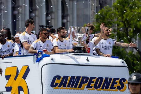 Photo for Madrid, Spain - May 12, 2024: Real Madrid football team celebrates its 36th league title in the Plaza de Cibeles. The players celebrate being league champions. League champions 23/24. - Royalty Free Image