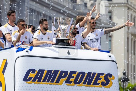 Photo for Madrid, Spain - May 12, 2024: Real Madrid football team celebrates its 36th league title in the Plaza de Cibeles. The players celebrate being league champions. League champions 23/24. - Royalty Free Image