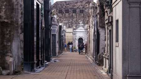 Photo for People walking inside historical Recoleta cemetary on a cold autumn afternoon - Royalty Free Image