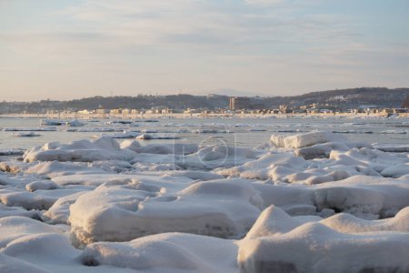 Photo for Ice floes in bay Abashiri City in background, Hokkaido, Japan - Royalty Free Image