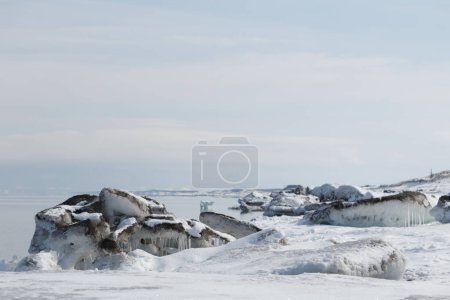 Photo for Sea ice on snowy beach in winter, Hokkaido, Japan - Royalty Free Image