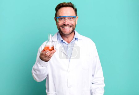 Photo for Middle age man looking happy and pleasantly surprised. scientist concept - Royalty Free Image