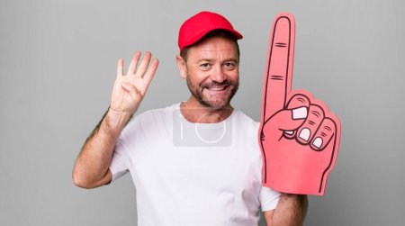 Photo for Middle age man smiling and looking friendly, showing number four. number one fan concept - Royalty Free Image