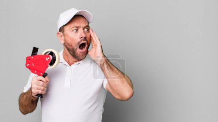 Photo for Middle age man feeling happy, excited and surprised. company employee - Royalty Free Image
