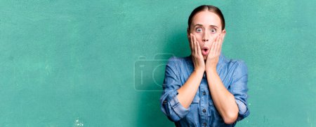 Photo for Caucasian pretty woman feeling shocked and scared - Royalty Free Image