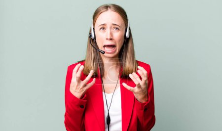 Photo for Looking desperate, frustrated and stressed. telemarketer concept - Royalty Free Image