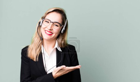 Photo for Smiling cheerfully, feeling happy and showing a concept. telemarketer concept - Royalty Free Image