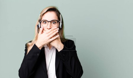 Photo for Covering mouth with hands with a shocked. telemarketer concept - Royalty Free Image