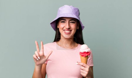 Photo for Smiling and looking friendly, showing number three. ice cream and summer concept - Royalty Free Image
