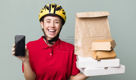 Téléchargez les photos : Pretty blonde deliverywoman with a paper bag - en image libre de droit