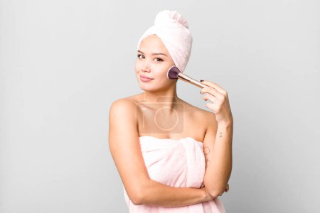 Photo for Hispanic pretty young woman wearing bathrobe. beauty and make up concept - Royalty Free Image