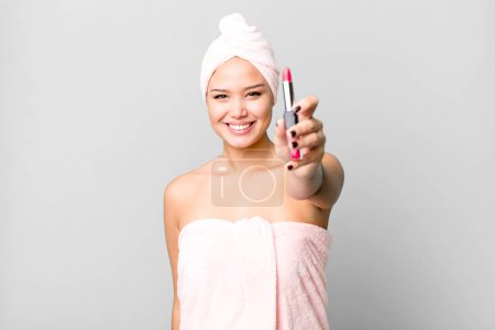 Photo for Hispanic pretty young woman wearing bathrobe. beauty and make up concept - Royalty Free Image