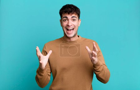 Photo for Man feeling happy, astonished, lucky and surprised, like saying omg seriously? Unbelievable - Royalty Free Image