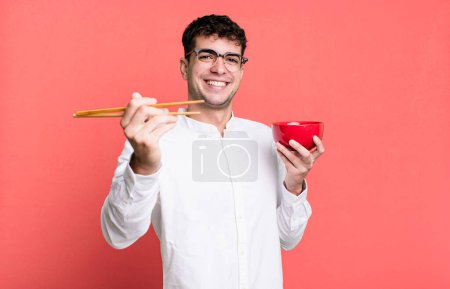 Photo for Adult man with a ramen bowl - Royalty Free Image