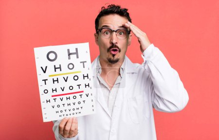 Photo for Adult man looking happy, astonished and surprised. optical vision test concept - Royalty Free Image