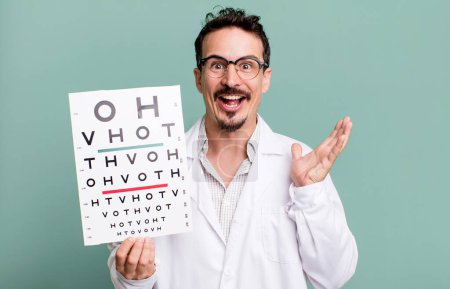 Photo for Adult man feeling happy and astonished at something unbelievable. optical vision test concept - Royalty Free Image