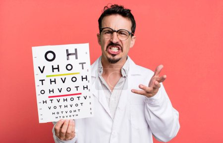 Foto de Adult man looking angry, annoyed and frustrated. optical vision test concept - Imagen libre de derechos