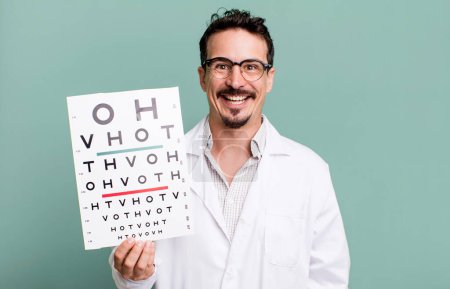 Photo for Adult man looking happy and pleasantly surprised. optical vision test concept - Royalty Free Image