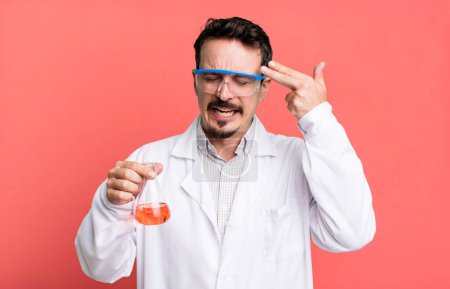 Photo for Adult man looking unhappy and stressed, suicide gesture making gun sign. scientist concept - Royalty Free Image