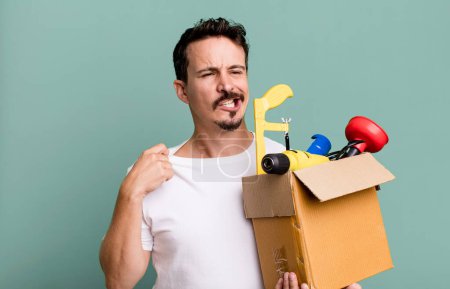 Photo for Adult man feeling stressed, anxious, tired and frustrated. with a toolbox. handyman concept - Royalty Free Image