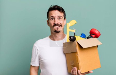 Photo for Adult man looking puzzled and confused. with a toolbox. handyman concept - Royalty Free Image