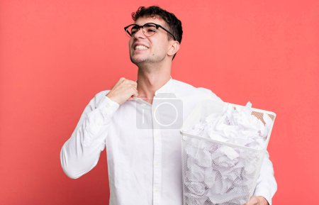 Photo for Adult man feeling stressed, anxious, tired and frustrated. paper balls mistakes trash - Royalty Free Image