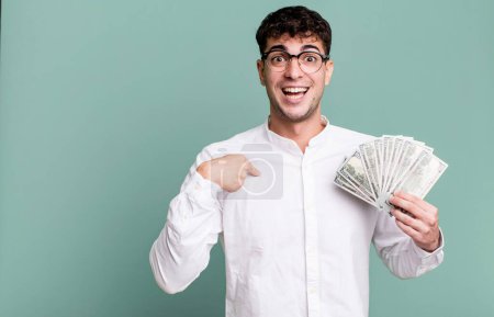Photo for Adult man feeling happy and pointing to self with an excited. dollar banknotes concept - Royalty Free Image
