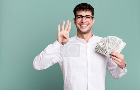 Photo for Adult man smiling and looking friendly, showing number four. dollar banknotes concept - Royalty Free Image