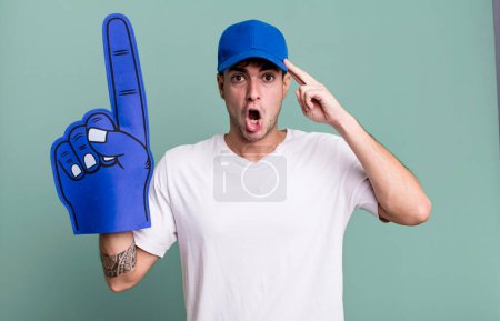 Photo for Adult man looking surprised, realizing a new thought, idea or concept. number one fan concept - Royalty Free Image