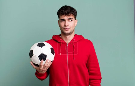 Photo for Adult man feeling sad, upset or angry and looking to the side. soccer and sport concept - Royalty Free Image