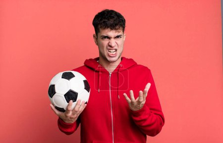 Photo for Adult man looking angry, annoyed and frustrated. soccer and sport concept - Royalty Free Image