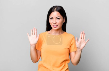 Photo for Pretty latin woman looking nervous, anxious and concerned, saying not my fault or I didnt do it - Royalty Free Image
